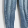 Salopette en denim ultra-doux à coupe en fer à cheval