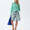 Shorts en denim long à taille mi-haute de 11"