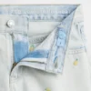 Shorts en denim « Stride » à taille basse pour enfants, brodés d’un citron