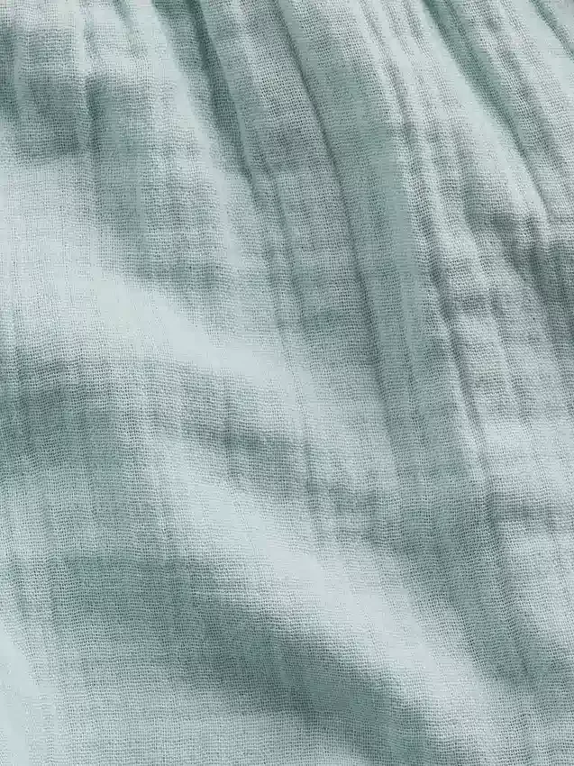 Shorts en gaze de coton pour enfant à ourlet papillon