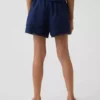 Shorts facile à enfiler pour enfant en lin et coton avec bordure en dentelle