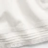 Shorts facile à enfiler pour enfant en lin et coton avec bordure en dentelle