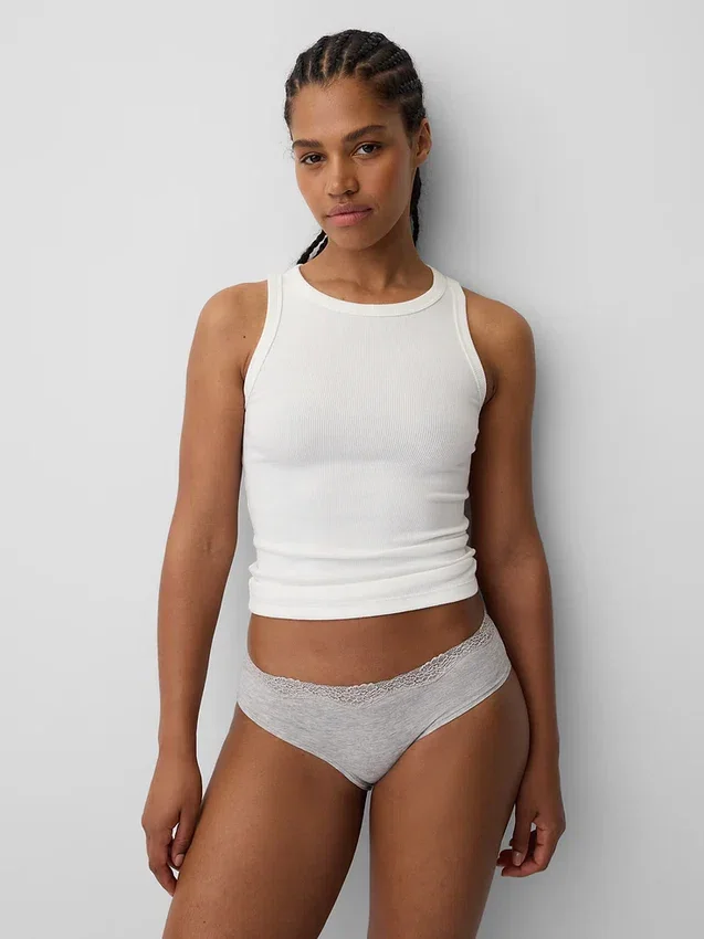 Slip taille basse en coton stretch bio avec bordure en dentelle