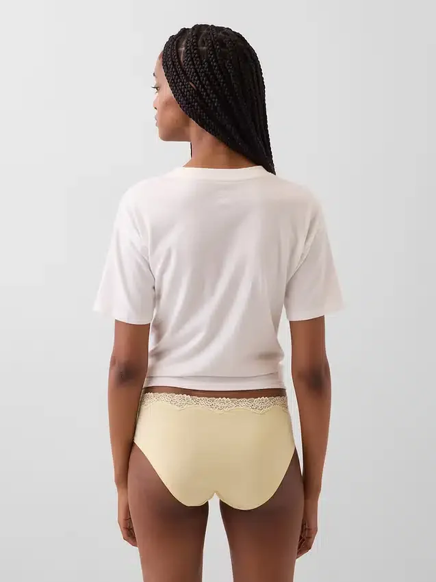Slip taille basse en coton stretch bio avec bordure en dentelle