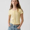 T-shirt enfant en maille pointelle côtelée à boutons sur le devant