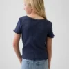 T-shirt enfant en maille pointelle côtelée à boutons sur le devant