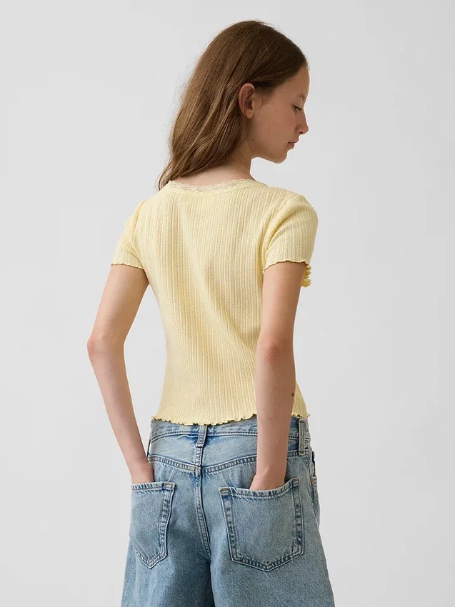 T-shirt enfant en maille pointelle côtelée à boutons sur le devant