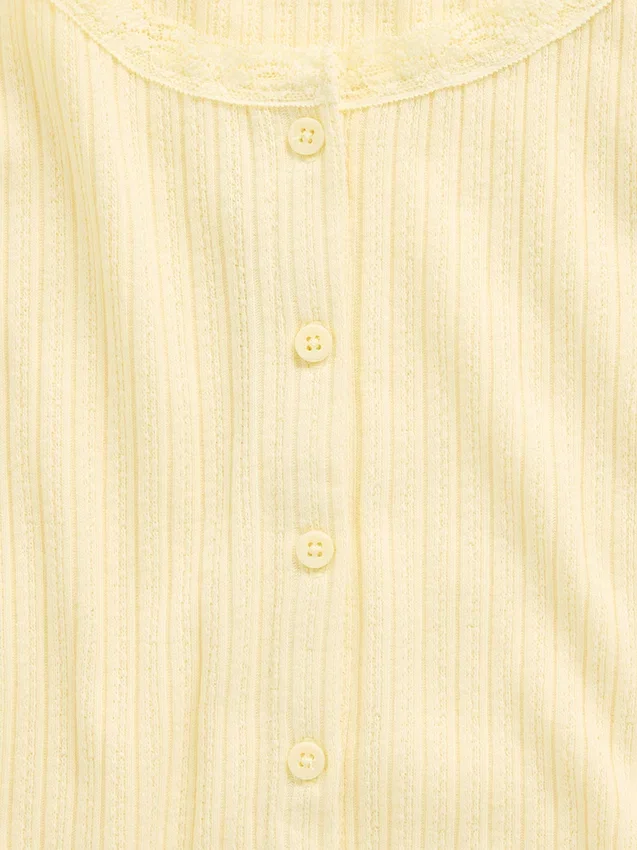 T-shirt enfant en maille pointelle côtelée à boutons sur le devant