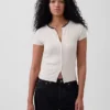T-shirt moderne à col rond et boutons sur le devant