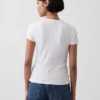 T-shirt moderne à col rond et boutons sur le devant