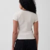 T-shirt moderne à col rond et boutons sur le devant