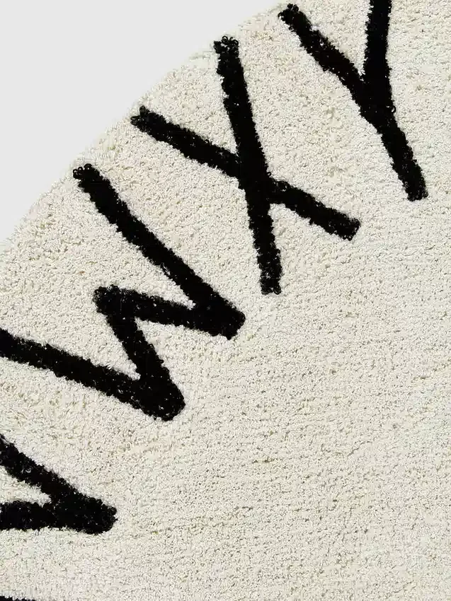 Tapis lavable Lorena Canals « Abc » noir naturel