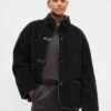 Veste en sherpa recyclé avec finitions en cuir vegan