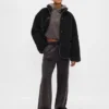 Veste en sherpa recyclé avec finitions en cuir vegan
