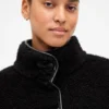 Veste en sherpa recyclé avec finitions en cuir vegan