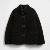 Veste en sherpa recyclé avec finitions en cuir vegan